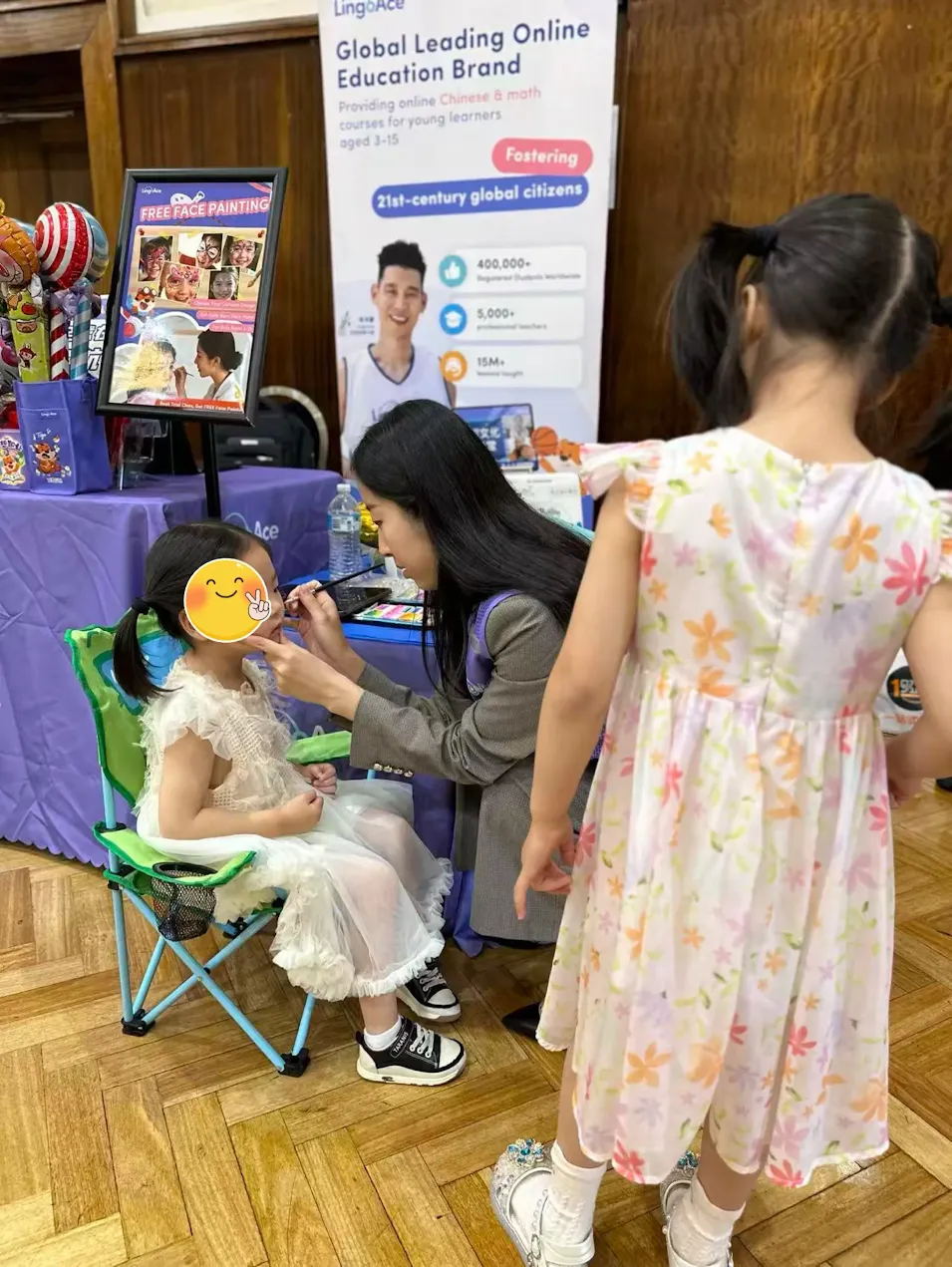 Child getting their face painted